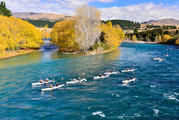 Kayakers paddling the Clutha River during the 2013 Wild Descent.